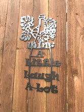Load image into Gallery viewer, a wooden wall with a clock on it