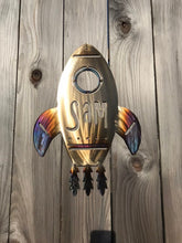 Load image into Gallery viewer, a clock that is on the side of a wall