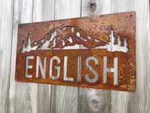 Load image into Gallery viewer, a sign that is on a wooden pole