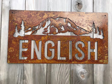 Load image into Gallery viewer, a sign that is on a wooden pole