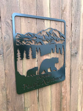 Load image into Gallery viewer, a sign that is on the side of a building