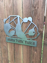 Load image into Gallery viewer, a street sign that is on a wooden pole