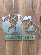 Load image into Gallery viewer, a sign that is on a wooden pole
