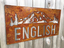 Load image into Gallery viewer, a close up of a street sign on a pole