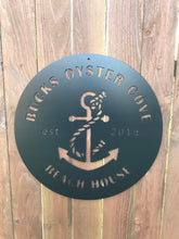 Load image into Gallery viewer, a clock that is on a wooden wall