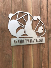 Load image into Gallery viewer, a sign that is on a wooden pole