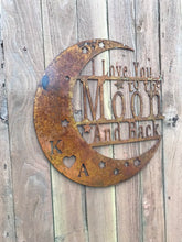 Load image into Gallery viewer, a wooden clock on the side of a wooden building