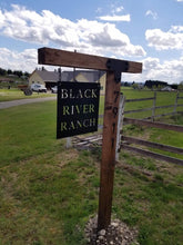 Load image into Gallery viewer, a wooden bench next to a wooden fence
