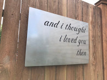 Load image into Gallery viewer, a sign that is on a wooden table