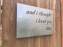 Load image into Gallery viewer, a sign that is on a wooden fence