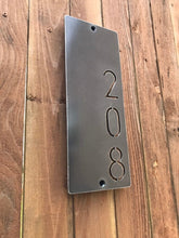 Load image into Gallery viewer, a piece of luggage sitting on top of a wooden table