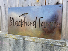 Load image into Gallery viewer, a sign that has graffiti on it