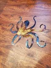 Load image into Gallery viewer, a pair of scissors sitting on top of a table