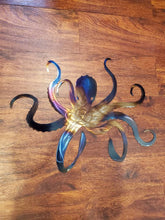 Load image into Gallery viewer, a pair of scissors sitting on top of a table