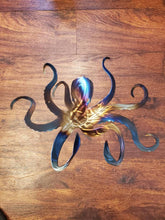 Load image into Gallery viewer, a pair of scissors sitting on top of a table