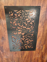Load image into Gallery viewer, a black and white vase on a wooden shelf
