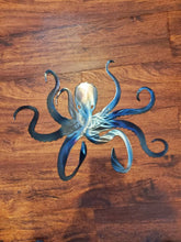 Load image into Gallery viewer, a close up of a pair of scissors
