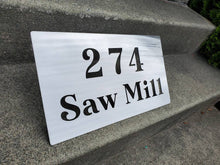 Load image into Gallery viewer, a sign on the side of a street