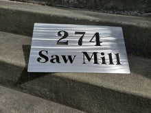 Load image into Gallery viewer, a sign that is on the side of a road