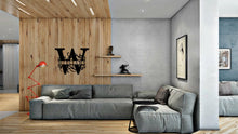 Load image into Gallery viewer, a living room filled with furniture and a fire place