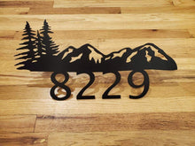Load image into Gallery viewer, several pairs of scissors sitting on a wooden table