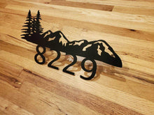 Load image into Gallery viewer, a pair of black scissors sitting on top of a wooden table